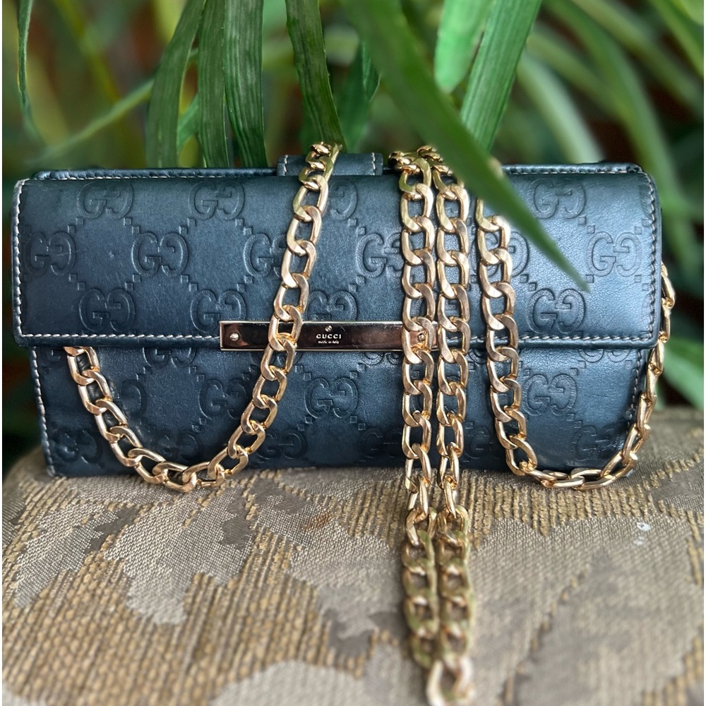 Authentic Gucci wallet with a chain